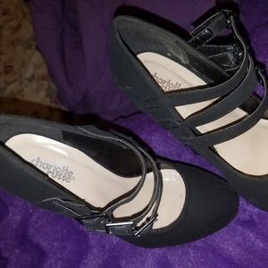 Strapped black heels